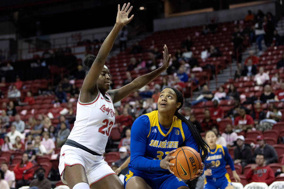 UNLV Lady Rebels center Desi-Rae Young (23) guards San José State Spartans forward Alani F ...