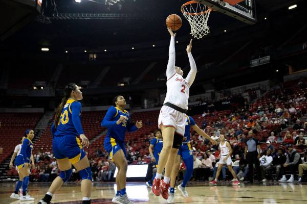 UNLV Lady Rebels guard Kenadee Winfrey (2) shoots after breaking away with the ball during the ...