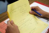 Daniel Hernandez looks at his test at a remedial math class on Thursday, April 20, 2017, at UNL ...