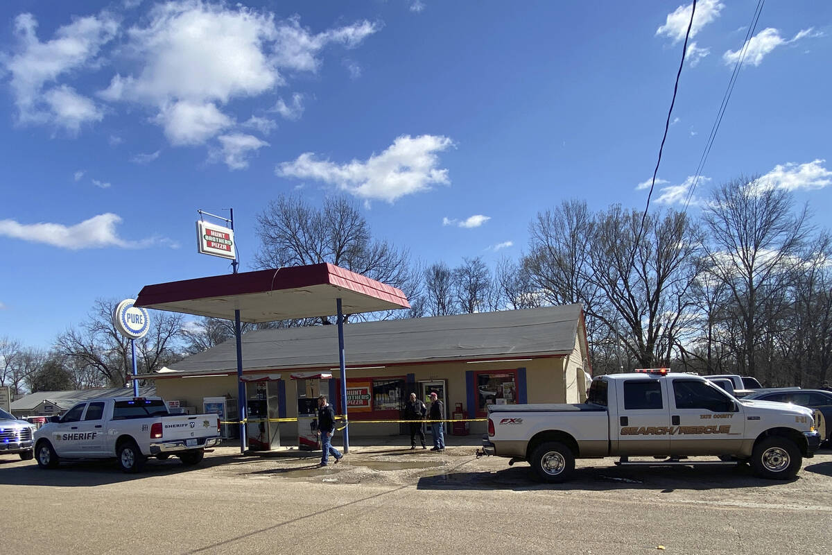 Law enforcement personnel work at the scene of a shooting Friday, Feb. 17, 2023, in Arkabutla, ...