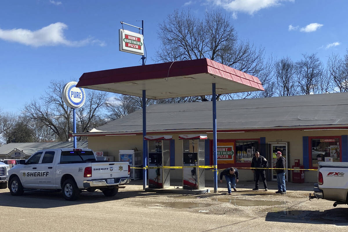 Law enforcement personnel work at the scene of a shooting Friday, Feb. 17, 2023, in Arkabutla, ...