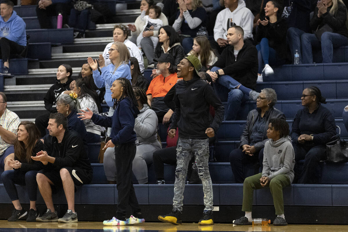 The Centennial fan section cheers for their team during a Class 5A Southern League championship ...