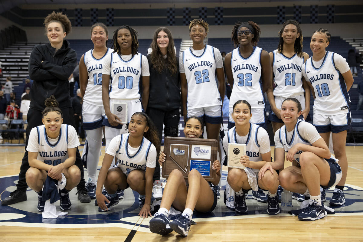 Centennial poses for a photo after winning the Class 5A Southern League championship game again ...