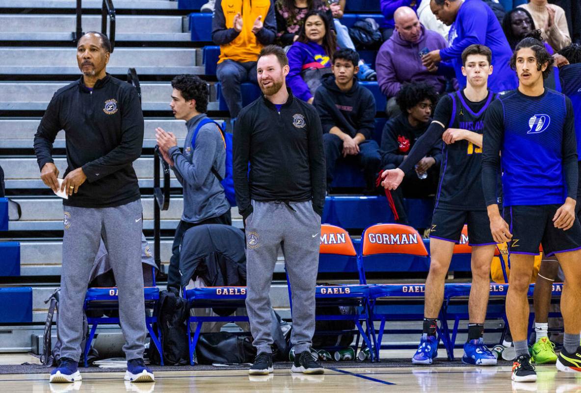 Durango assistant coach Mike Lee, left, and assistant coach Tim Jones lead their team versus Bi ...