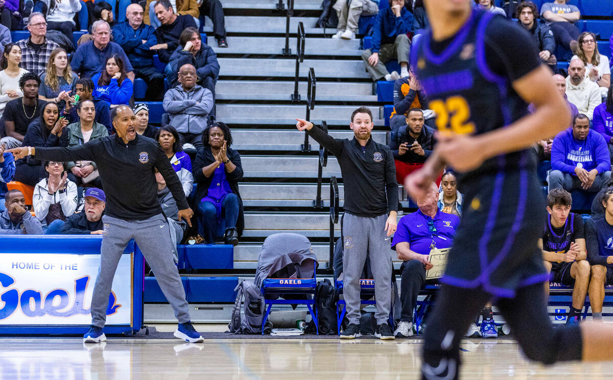 Durango assistant coach Mike Lee, left, and assistant coach Tim Jones direct their players vers ...