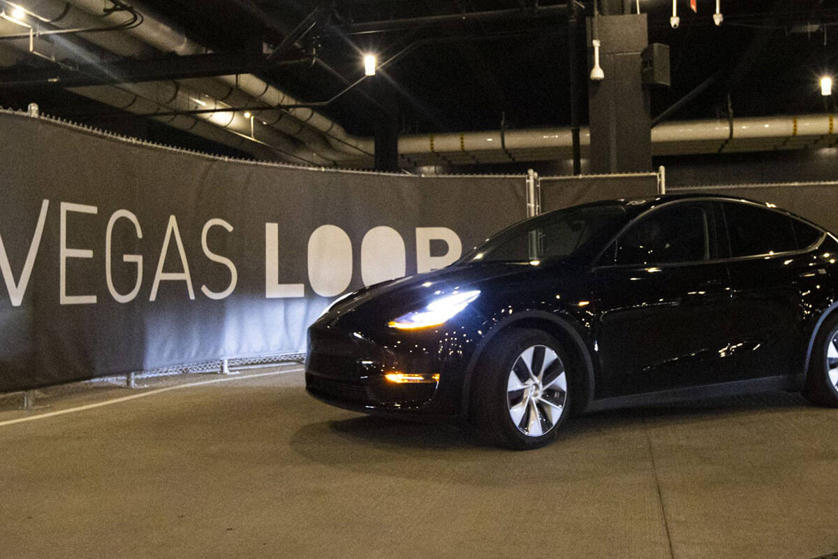 A Vegas Loop Tesla departs from the Boring tunnel passenger station at Resorts World Las Vegas ...