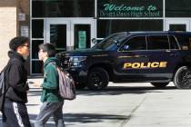 A Clark County School District police vehicle is seen as students at Desert Oasis High School l ...