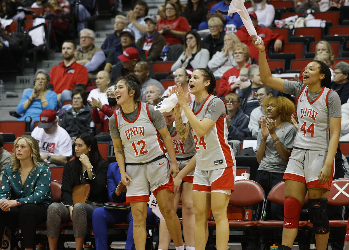 UNLV Lady Rebels guard Alyssa Durazo-Frescas (12), UNLV Lady Rebels guard Essence Booker (24) a ...