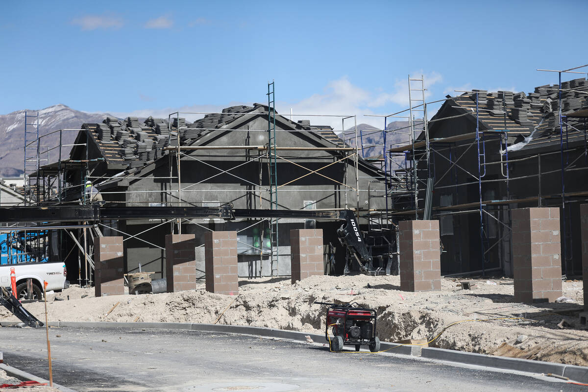 Townhomes under construction on the northeast corner of Farm Road and North Decatur Boulevard i ...