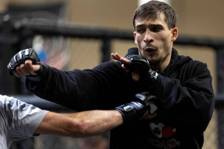 MMA fighter Biaggio Ali Walsh, grandson of legendary boxer Muhammad Ali, spars during training ...