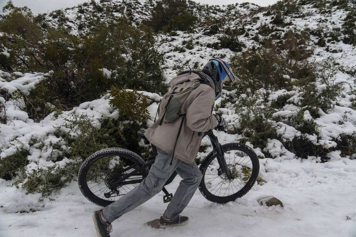 A man pushes his BMX bike up the canyon at the Deukmejian Wilderness Park, a rugged 709-acre si ...