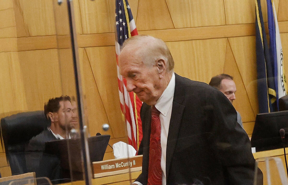 Deputy County Manager Jeff Wells leaves during a meeting of the Clark County Commission at the ...