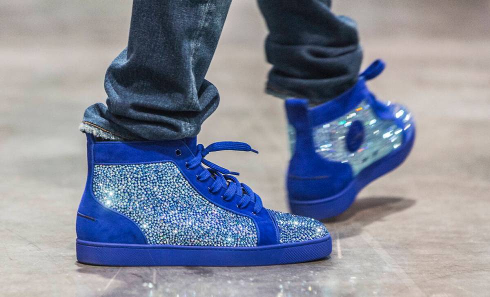 Cordero Brady, aka "CJ so Cool" sports his custom kicks during Sneaker Con at the Las Vegas Con ...