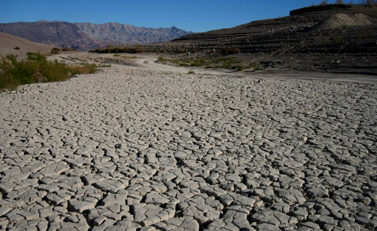 Cracked earth is visible in an area once under the water of Lake Mead at the Lake Mead National ...