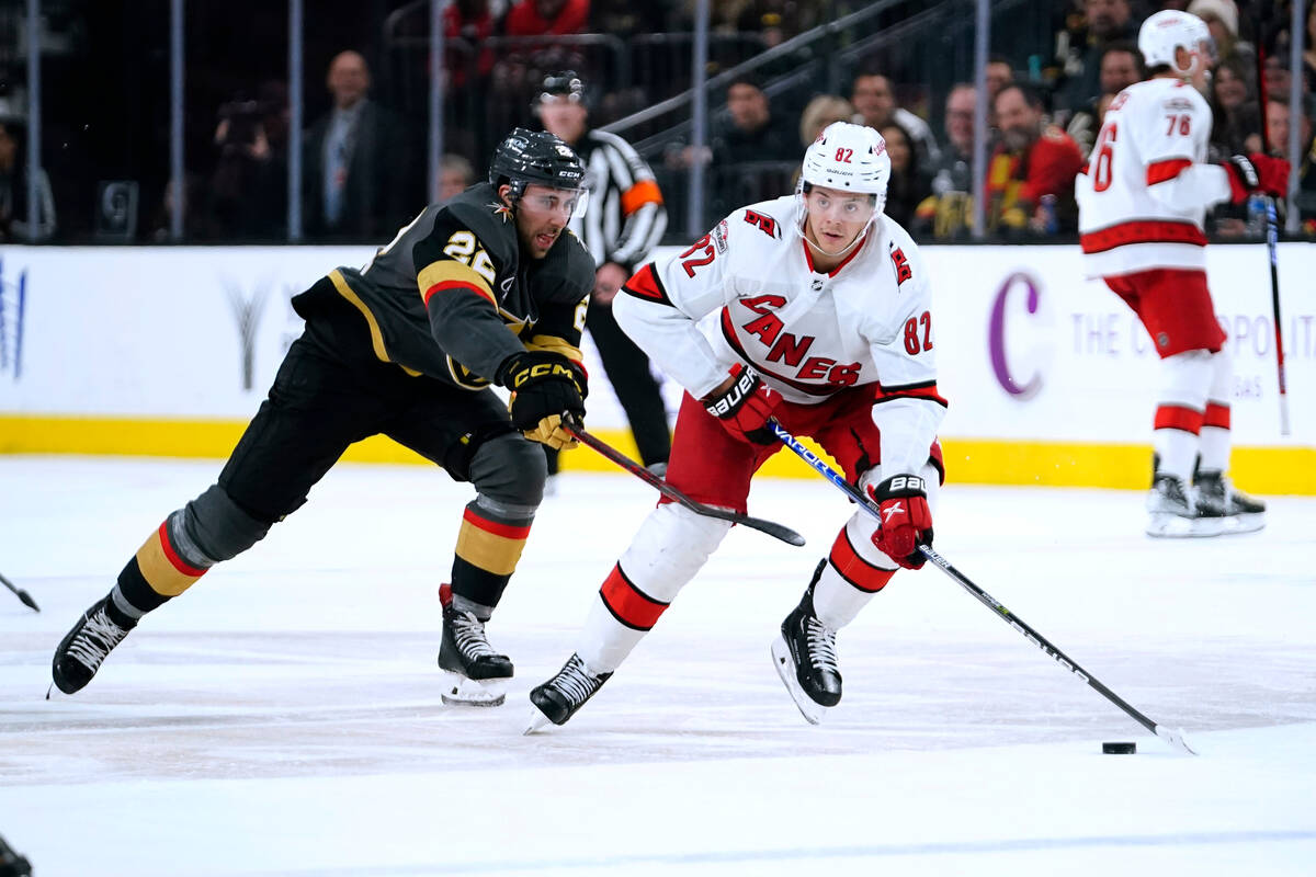 Carolina Hurricanes center Jesperi Kotkaniemi (82) skates with the puck against Vegas Golden Kn ...