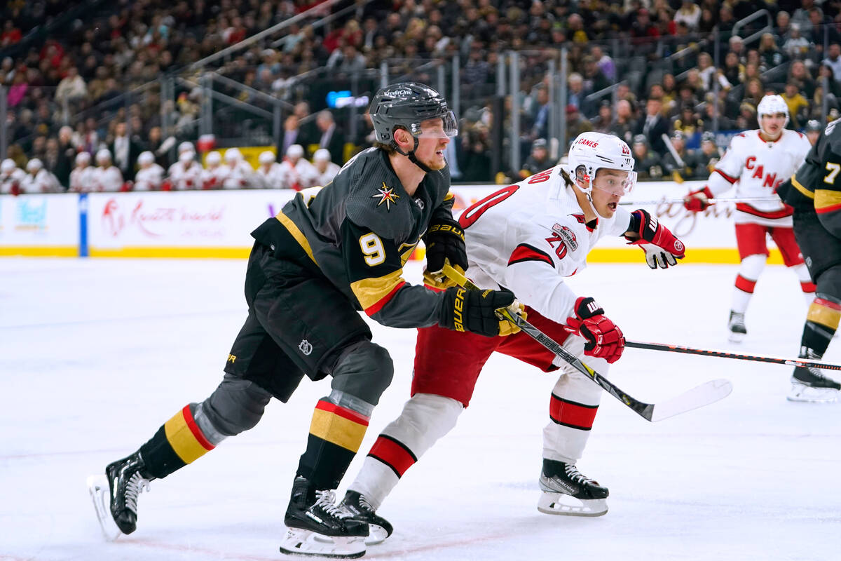 Vegas Golden Knights center Jack Eichel (9) skates against Carolina Hurricanes center Sebastian ...