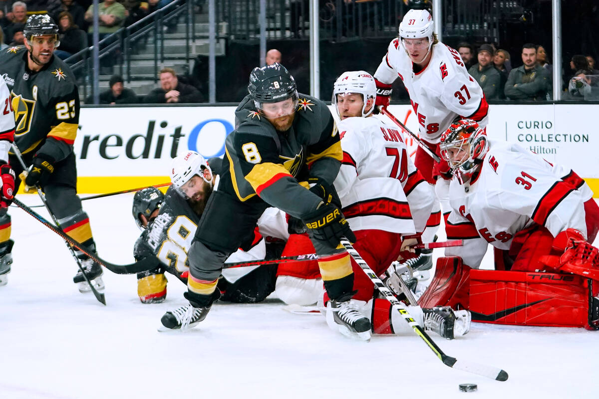 Vegas Golden Knights center Phil Kessel (8) attempts to score against Carolina Hurricanes goalt ...