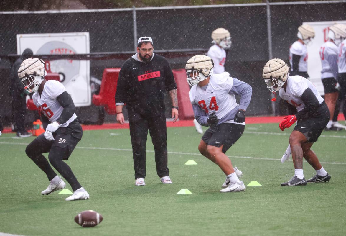 UNLV defensive lineman, including Ben Key (94), participate in drills during the first day of s ...