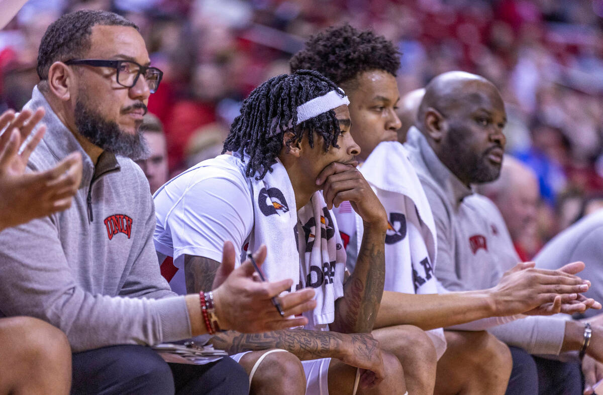 UNLV guard Justin Webster (2) looks to the court as Utah State dominates during the second half ...