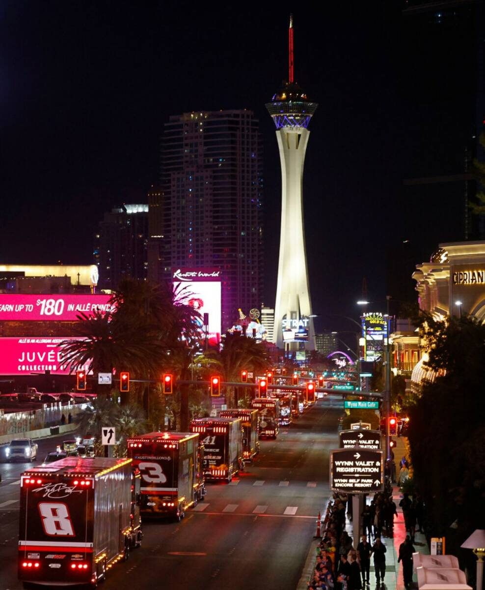 NASCAR Cup Series haulers parade down the Las Vegas Strip, Thursday, March 2, 2023. (Chitose Su ...
