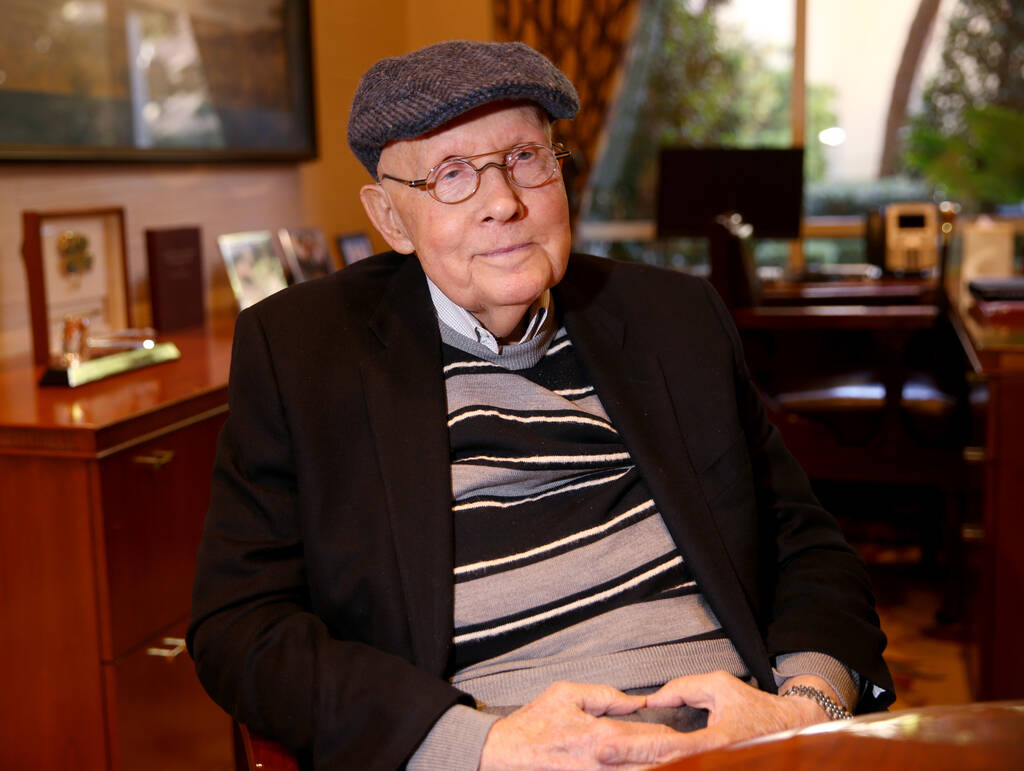 FILE - Former Nevada Sen. Harry Reid talks to a reporter in his office at the Bellagio in Las V ...