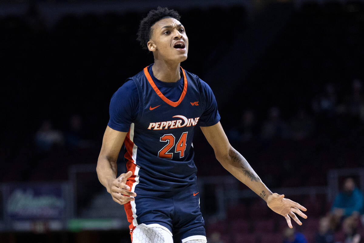 Pepperdine forward Maxwell Lewis (24), who is from Las Vegas, reacts to a missed point during a ...