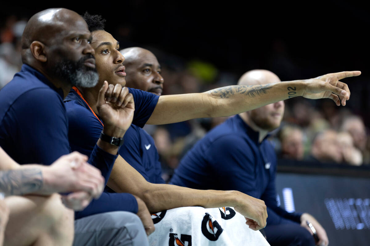 Pepperdine forward Maxwell Lewis, second from left, who is from Las Vegas, communicates with hi ...