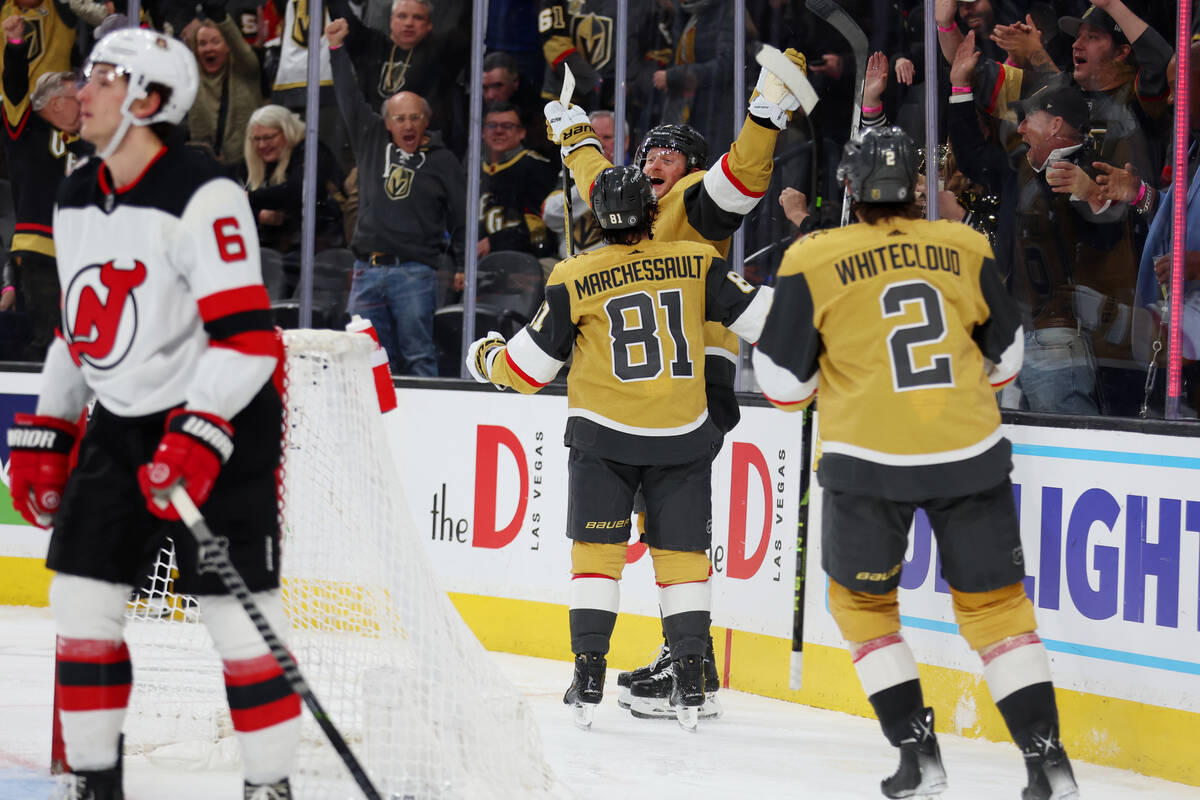 Vegas Golden Knights center Jack Eichel (9) celebrates his goal with right wing Jonathan Marche ...