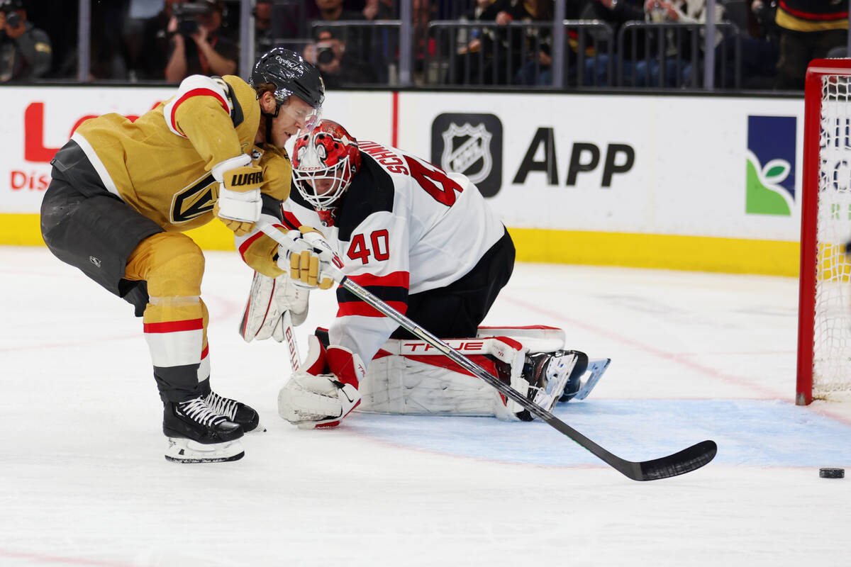 Vegas Golden Knights center William Karlsson (71) attempts a shot against New Jersey Devils goa ...