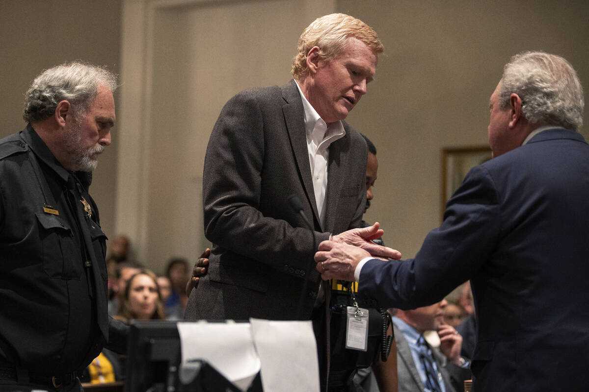 Alex Murdaugh, center, is handcuffed in the courtroom after a guilty verdict of his double murd ...