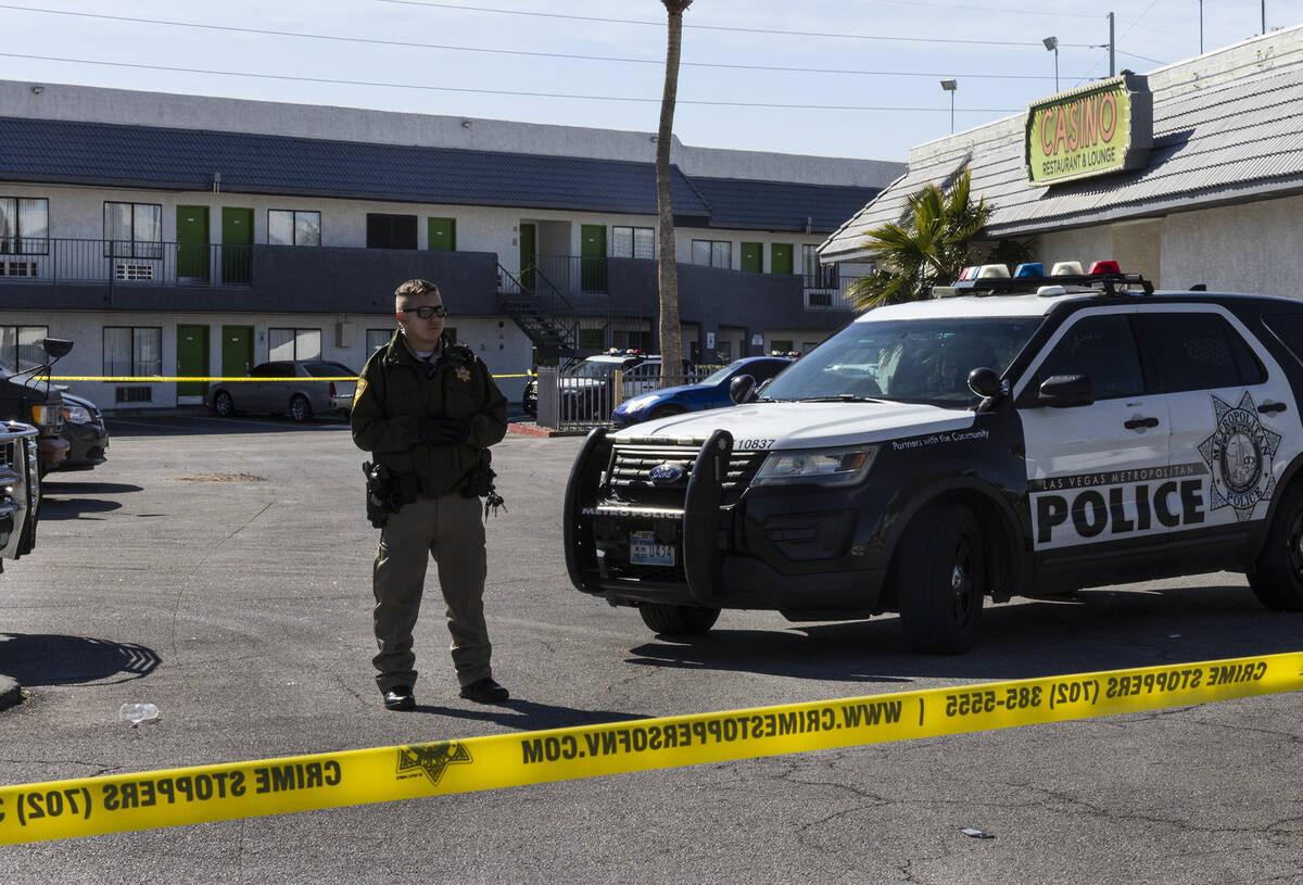 Las Vegas police investigate a homicide at an apartment complex at 5011 E. Craig Road, near Nor ...