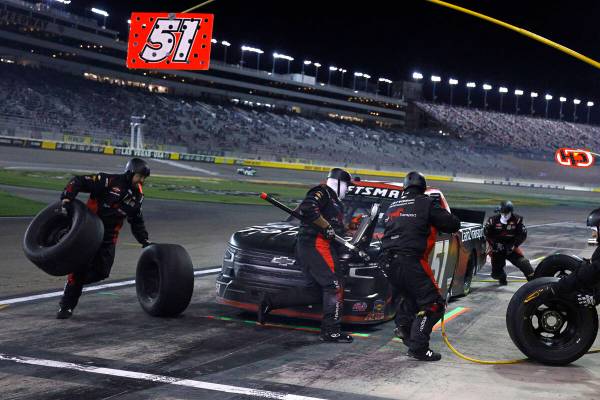 Kyle Busch (51) makes a pit stop during the NASCAR Craftsman Truck Series auto race at Las Vega ...