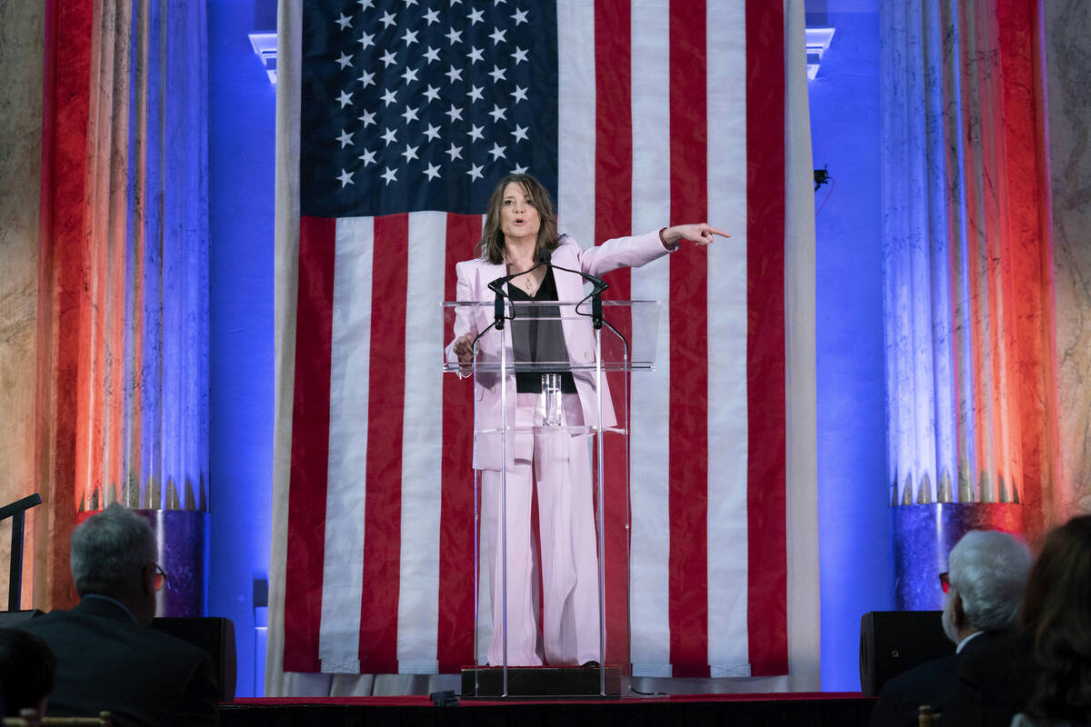 Self-help author Marianne Williamson speaks to the crowd as she launches her 2024 presidential ...