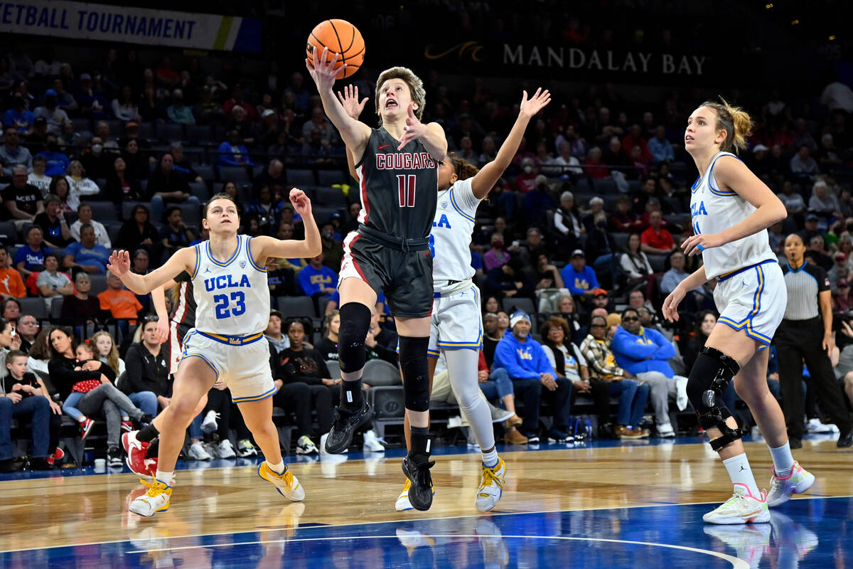 Washington State guard Astera Tuhina (11) lays up the ball against UCLA during the first half o ...