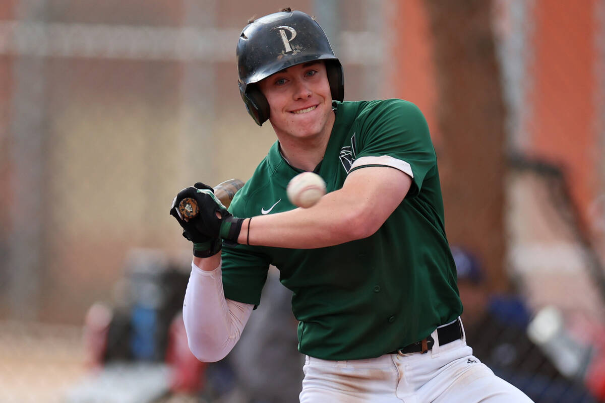 Palo Verde's Andrew Kaplan (19) looks at a high pitch during a baseball game against Legacy at ...