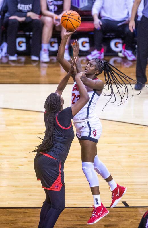 UNLV center Desi-Rae Young (23) posts up for a shot over San Diego State forward Yummy Morris ( ...