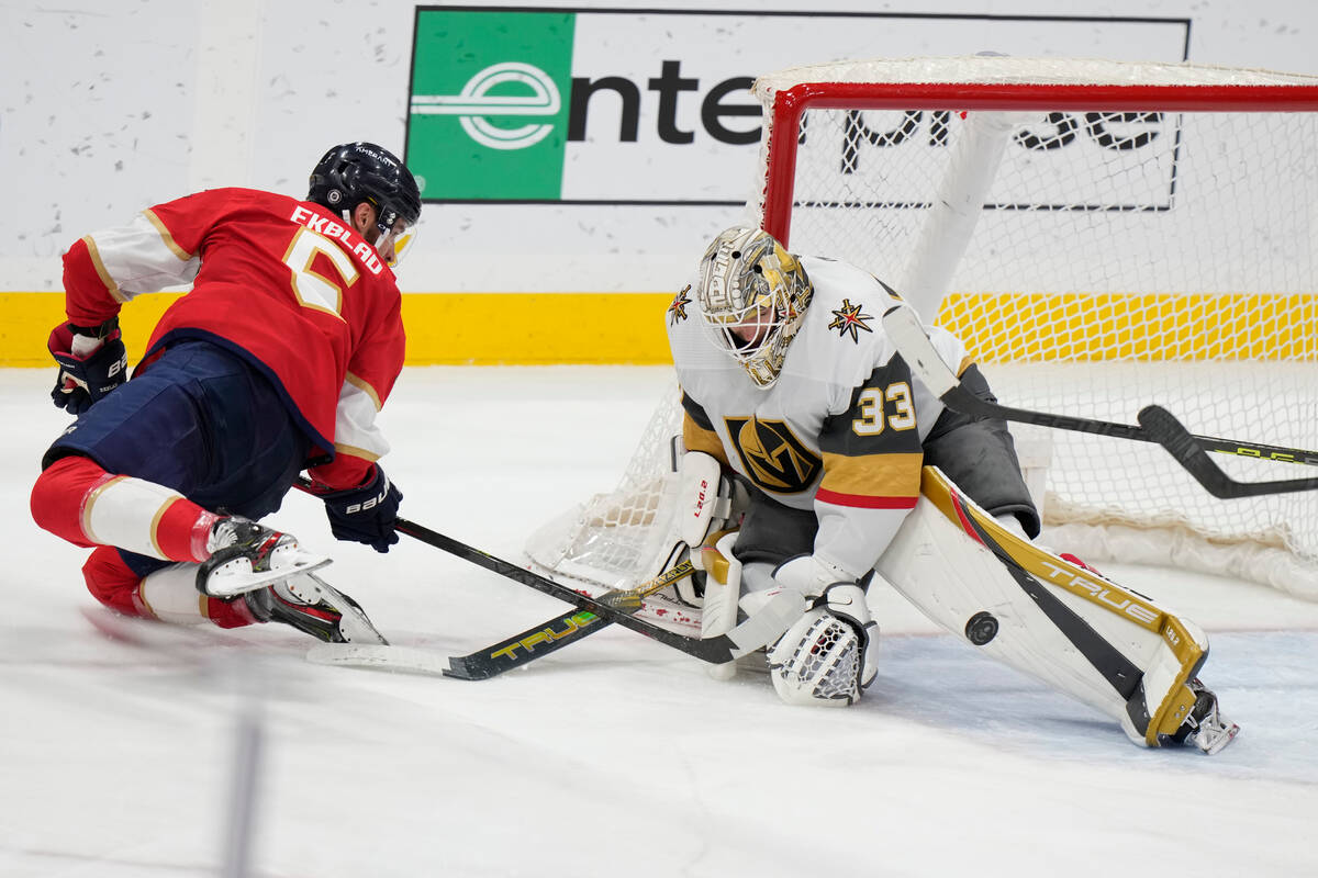 Florida Panthers defenseman Aaron Ekblad (5) attempts a shot at Vegas Golden Knights goaltender ...