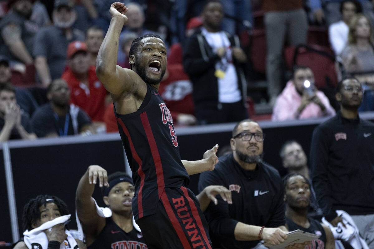 UNLV Rebels guard EJ Harkless (55) looks to the basket after shooting in the final seconds of t ...