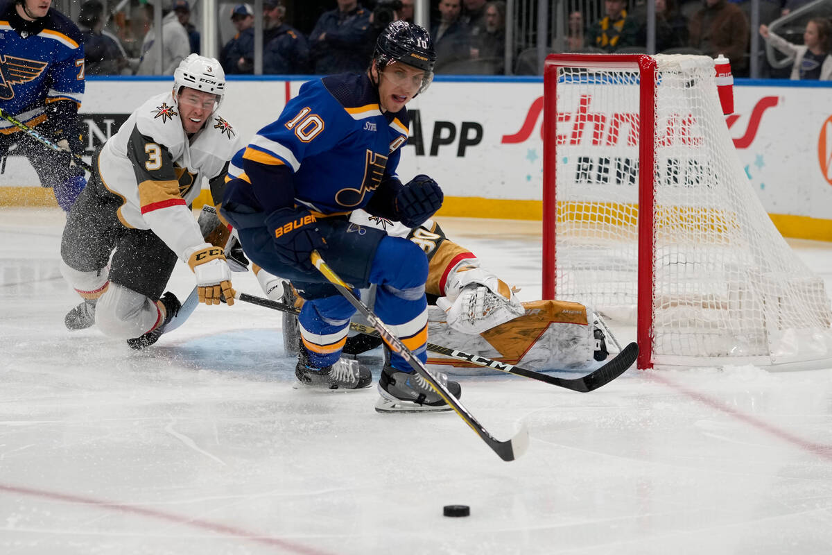 St. Louis Blues' Brayden Schenn (10) and Vegas Golden Knights' Brayden McNabb (3) chase after a ...