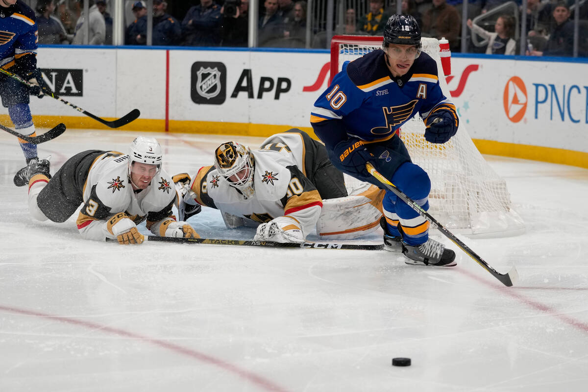 St. Louis Blues' Brayden Schenn (10) chases after a loose puck as Vegas Golden Knights goaltend ...