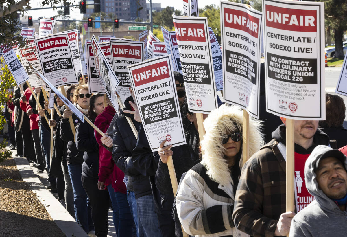 Culinary Union workers picket in front of the Las Vegas Convention Center, on Thursday, Feb.16, ...