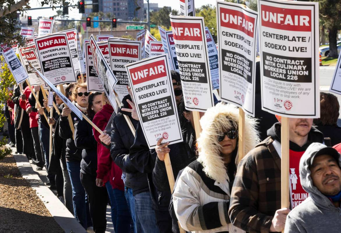 Culinary Union workers picket in front of the Las Vegas Convention Center, on Thursday, Feb.16, ...