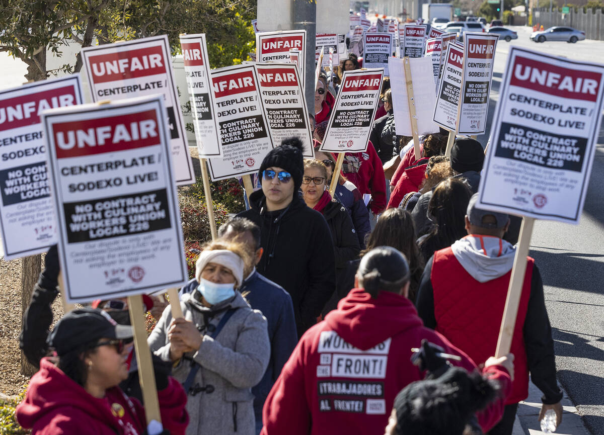 Culinary Union workers picket in front of the Las Vegas Convention Center, on Thursday, Feb.16, ...