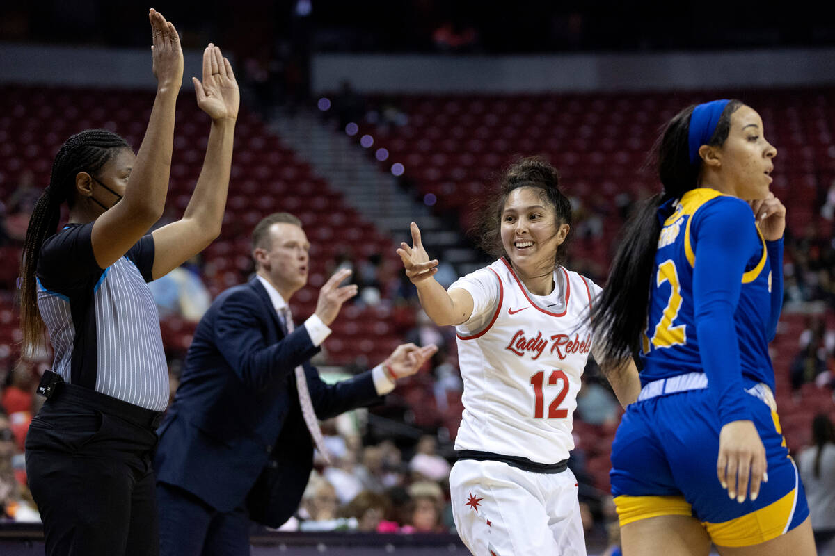 UNLV Lady Rebels guard Alyssa Durazo-Frescas (12) celebrates after scoring a three-pointer duri ...