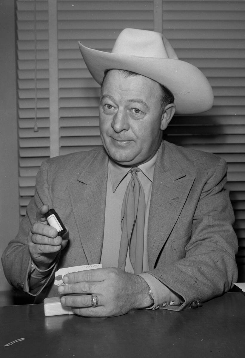 Clark County Sheriff Glen Jones reviews film in 1954.(File photo/Las Vegas Review-Journal)