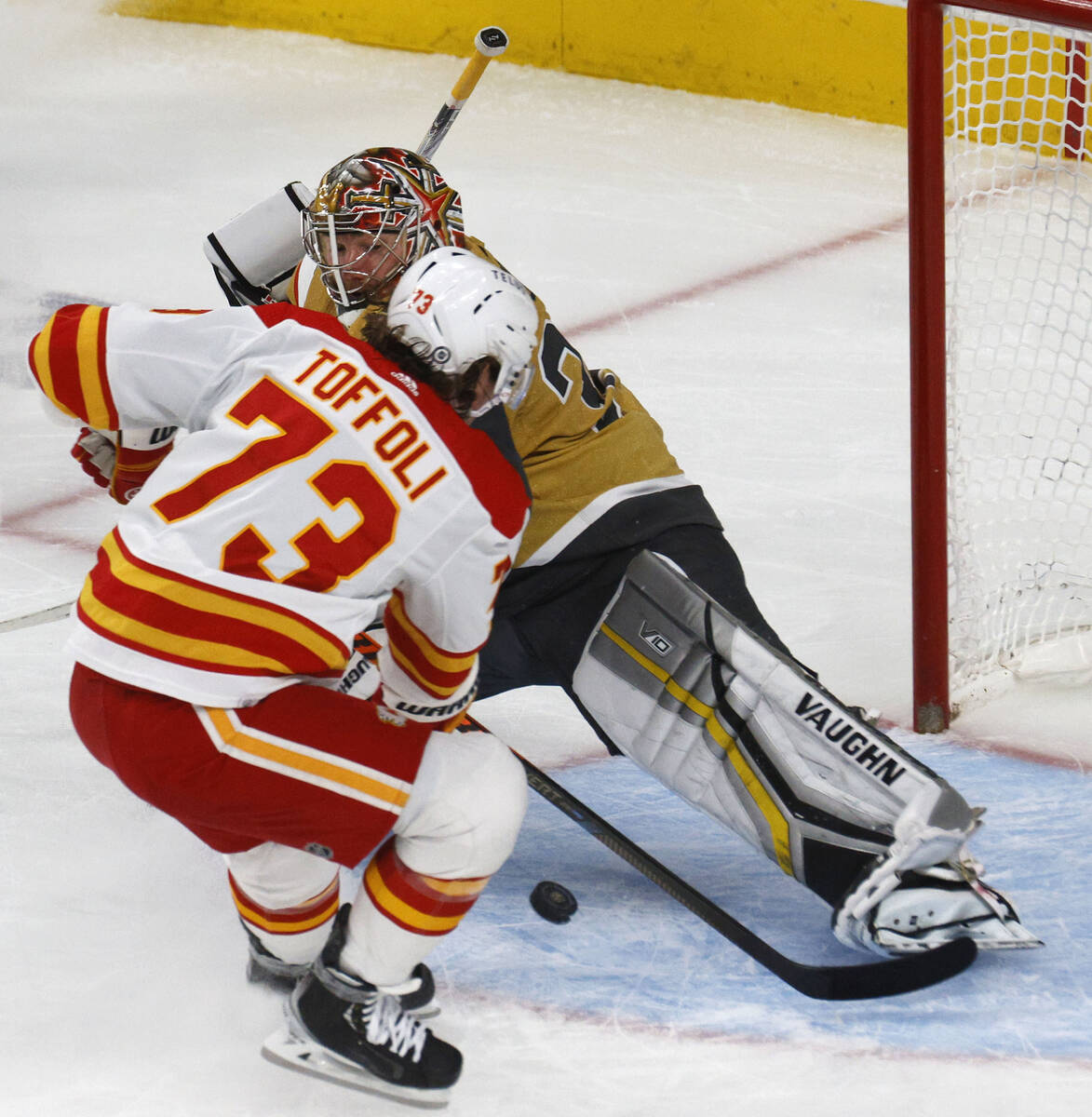 Calgary Flames right wing Tyler Toffoli (73) scores a goal against Vegas Golden Knights goalten ...