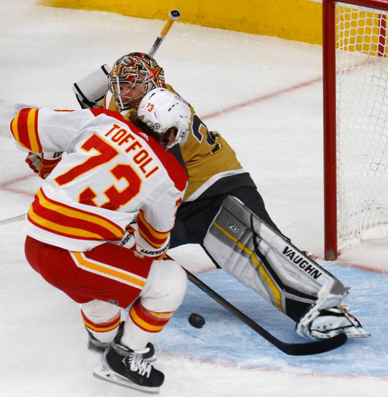 Calgary Flames right wing Tyler Toffoli (73) scores a goal against Vegas Golden Knights goalten ...