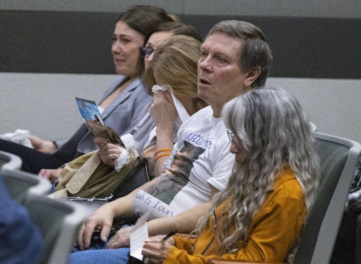 Cindy Peters, center, the mother of Rebekah Peters, a murder victim, weeps as she attends the s ...