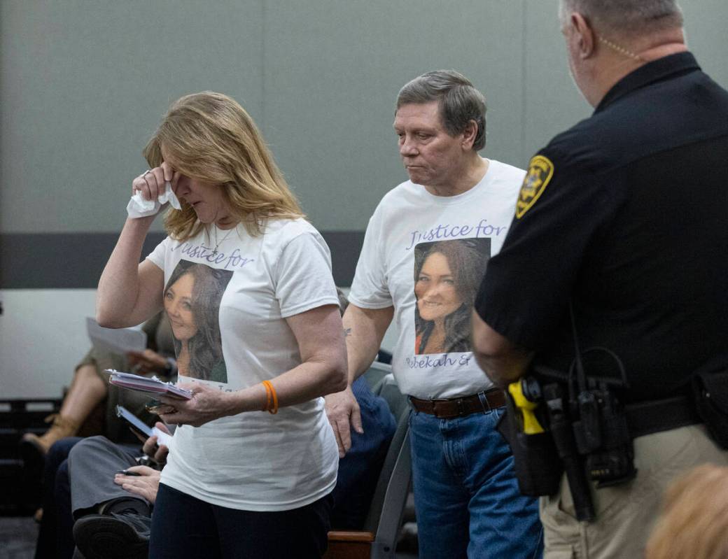 Cindy Peters, left, and her husband Mark, parent of Rebekah Peters, a murder victim, prepare to ...