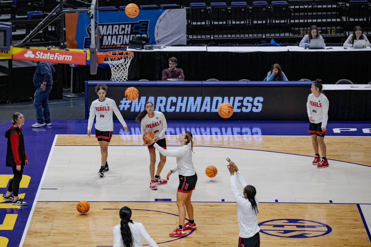 UNLV warm ups before a first-round college basketball game against Michigan in the women's NCAA ...